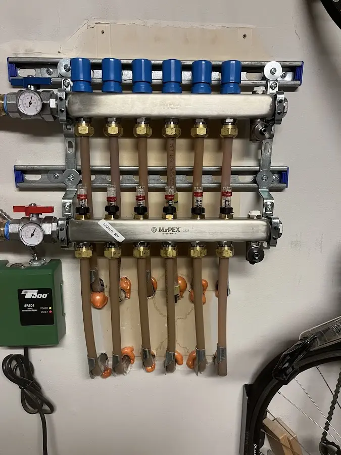 Plumber performing Water Heater Repair at a residential property in Williamsport